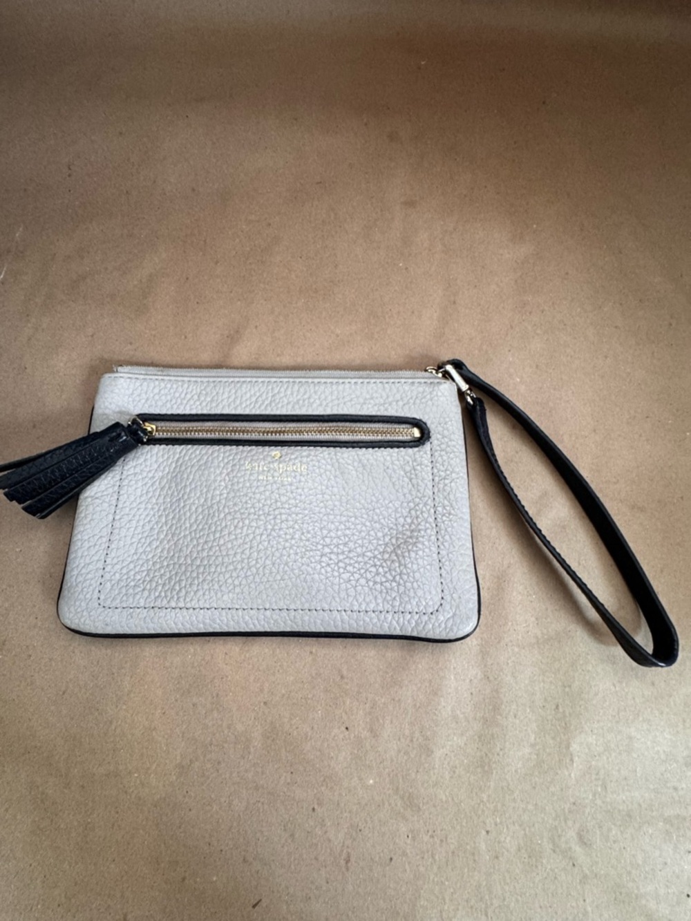 Kate Spade Chester Street Tinie Wristlet in Almond and Black Pebbled Leather